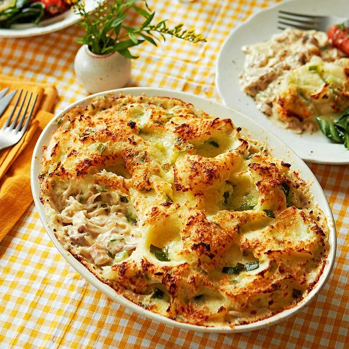 Poached chicken & pancetta pie with spring onion colcannon