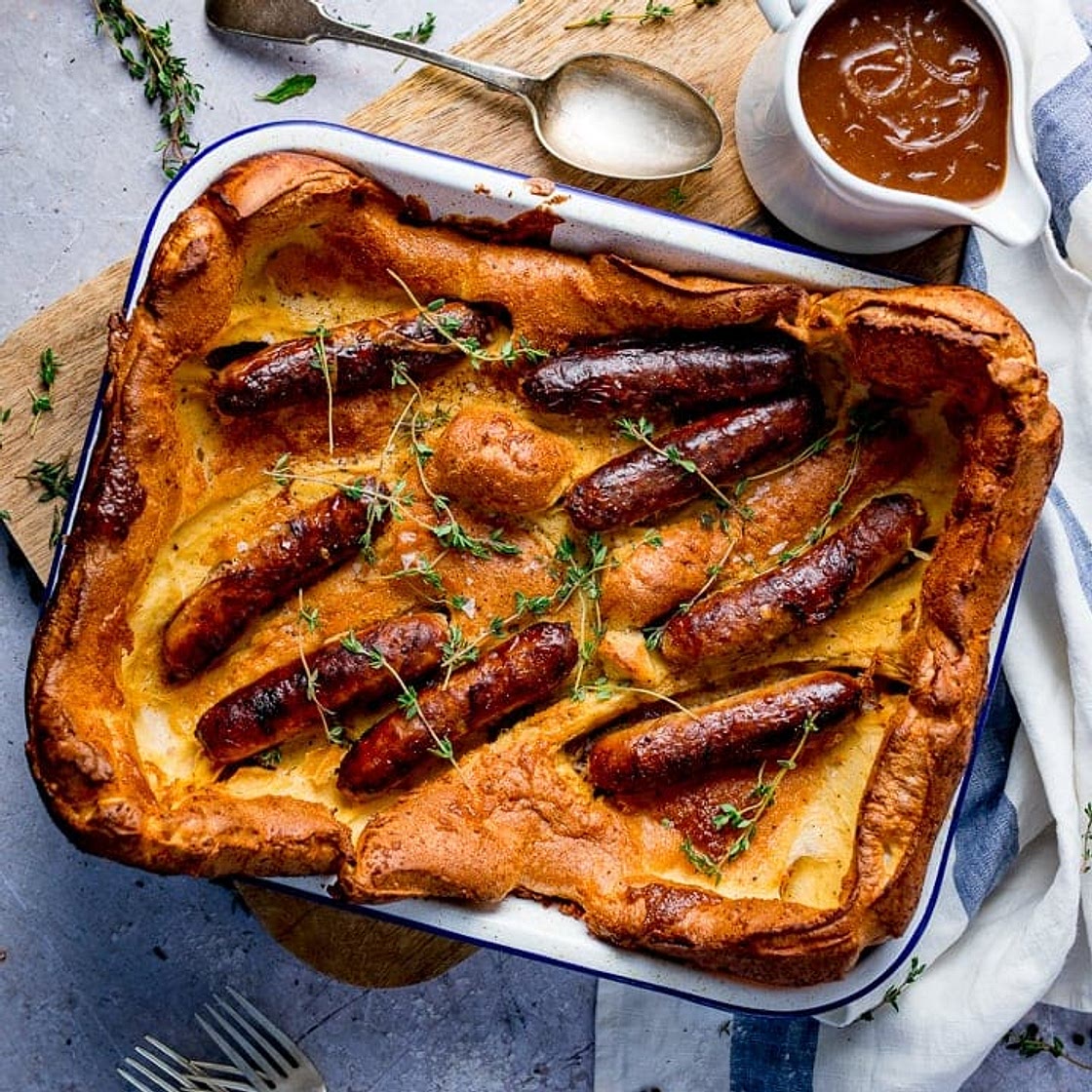 Toad in the hole with red onion gravy