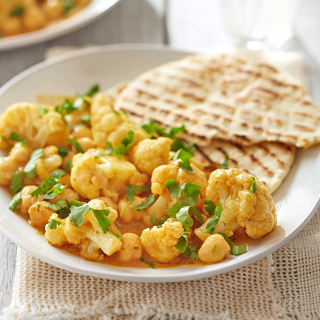 Satay cauliflower & chickpea curry with storecupboard flatbreads