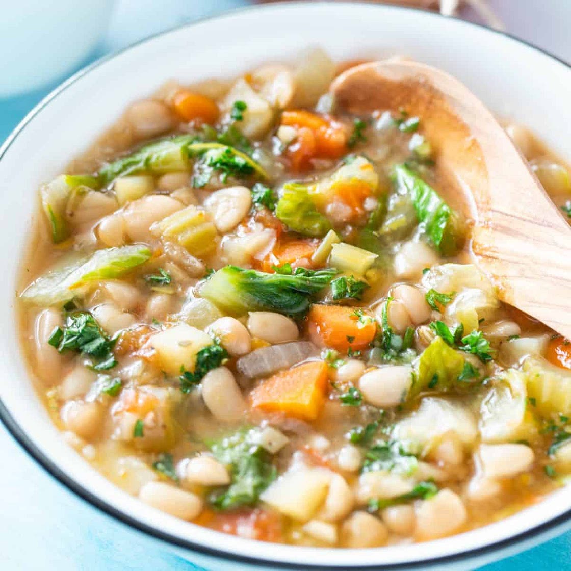 Creamy white bean soup with escarole and gremolata