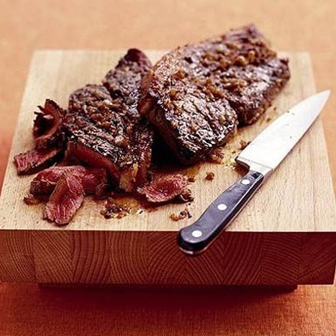 Sizzling steak with shallot marinade