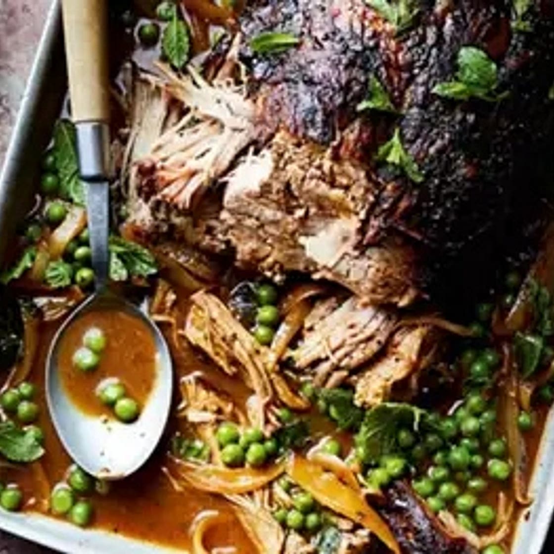 Slow-cooked pork shoulder with peas & mint
