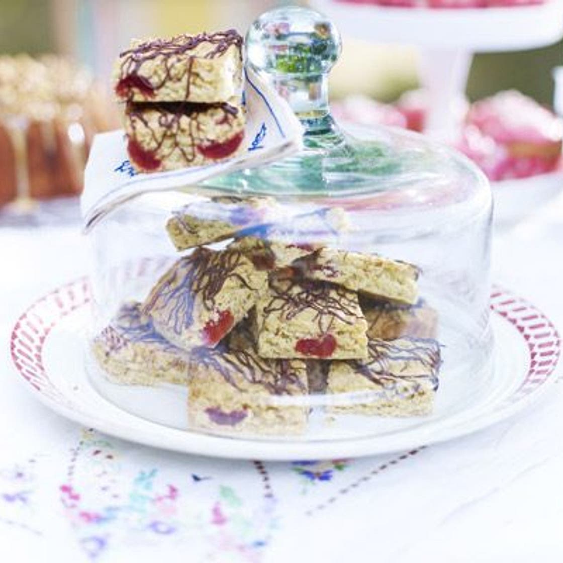Cherry oat squares with chocolate drizzle