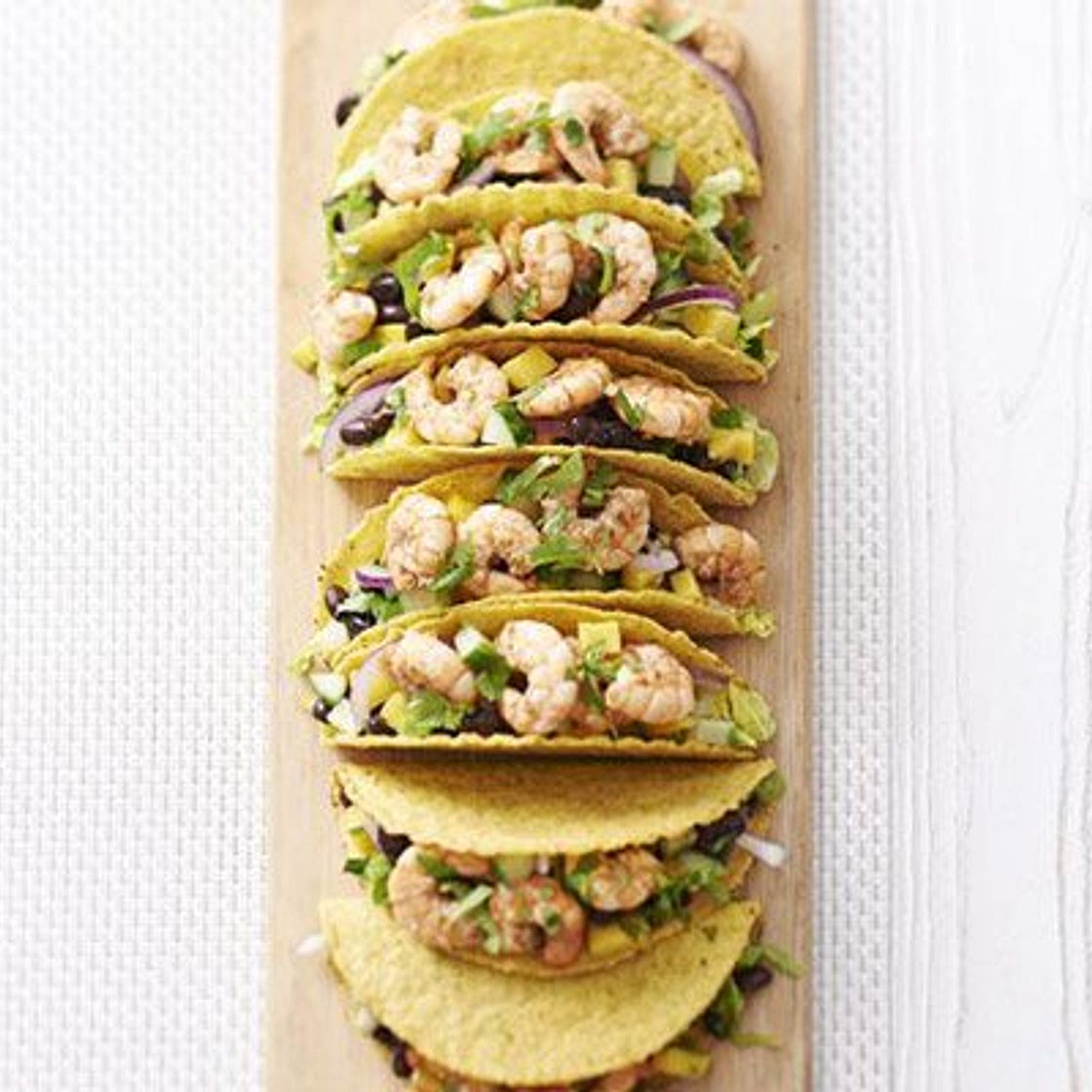 Spicy jerk prawn & mango tacos with coconut dressing