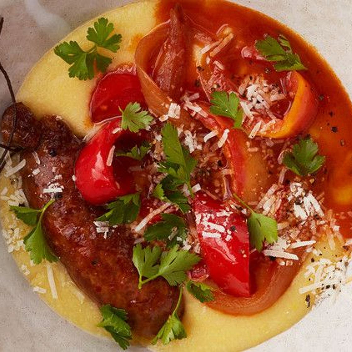 Sausage-and-Pepper Ragu Over Polenta