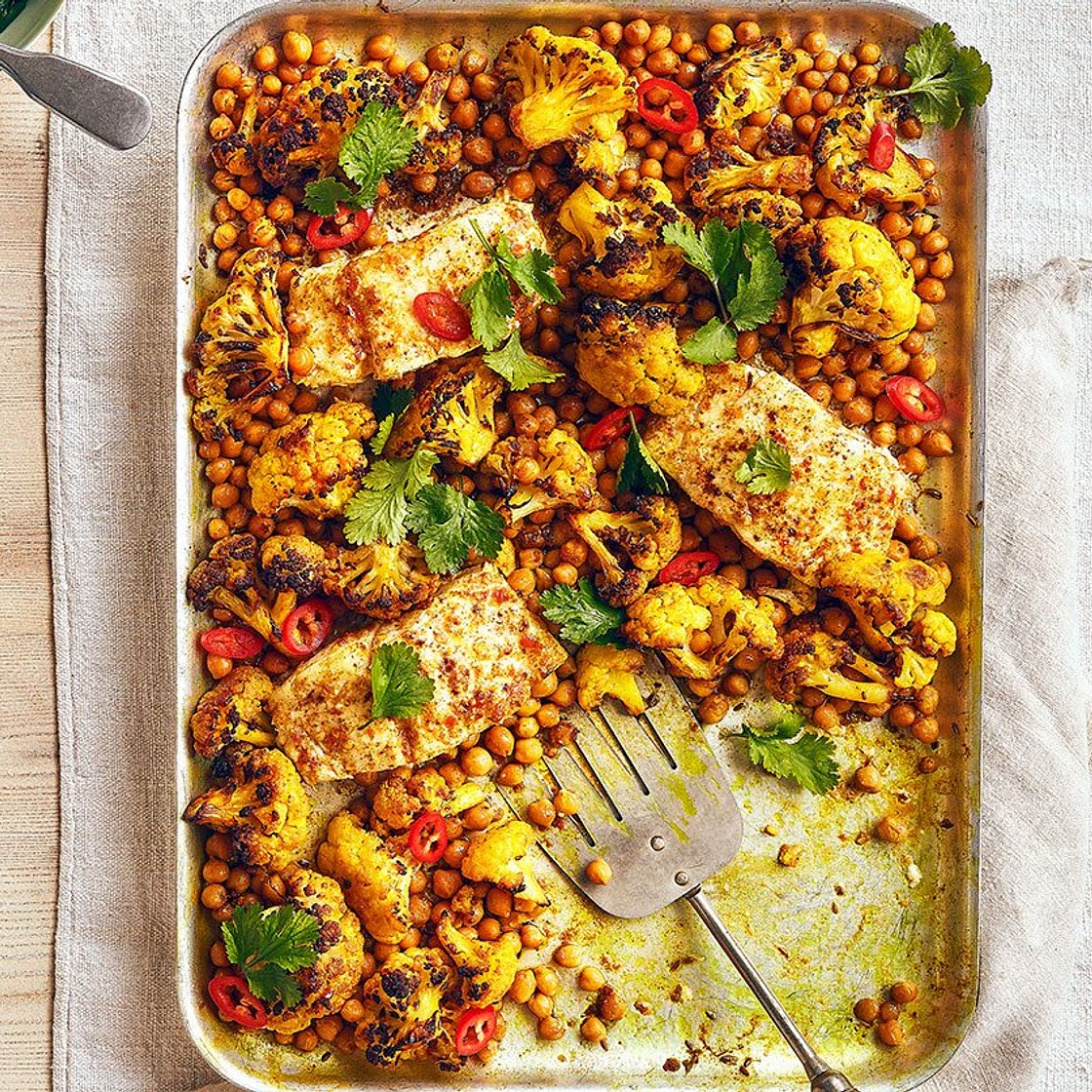 Curried butter-baked cod with cauliflower & chickpeas