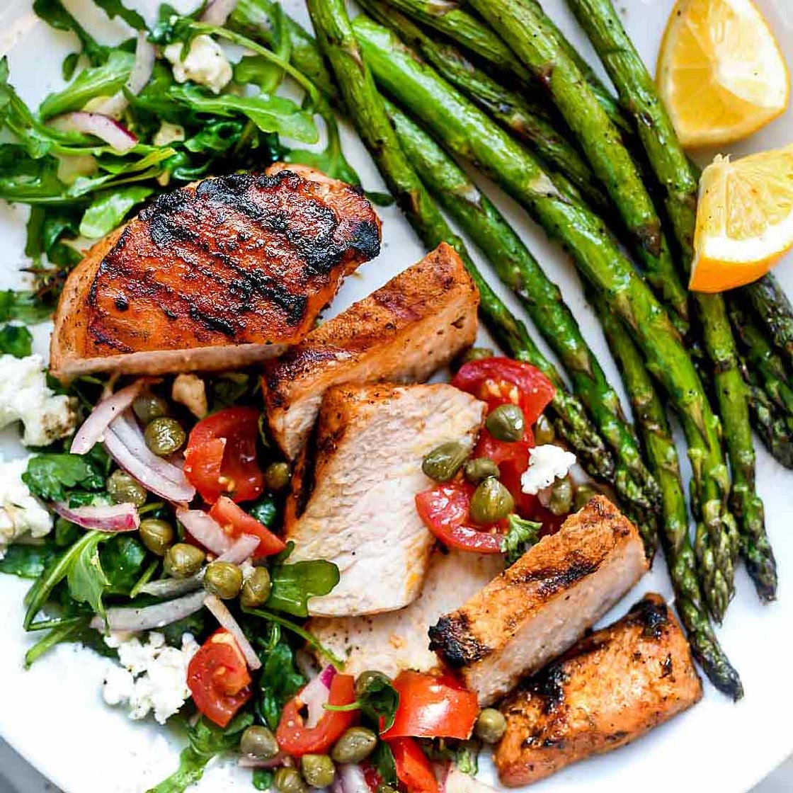 Mediterranean Grilled Pork Chops with Tomato Salad