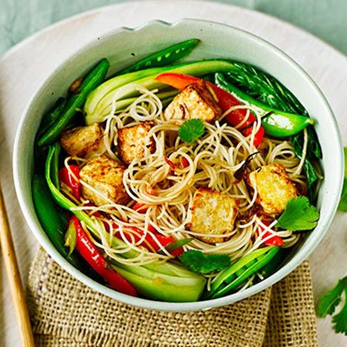 Asian tofu with stir-fried noodles, pak choi & sugar snap peas