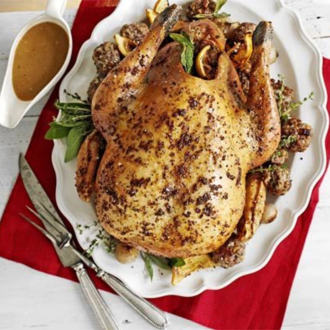 Roast turkey with pecan, sausage & chestnut stuffing & roast shallots