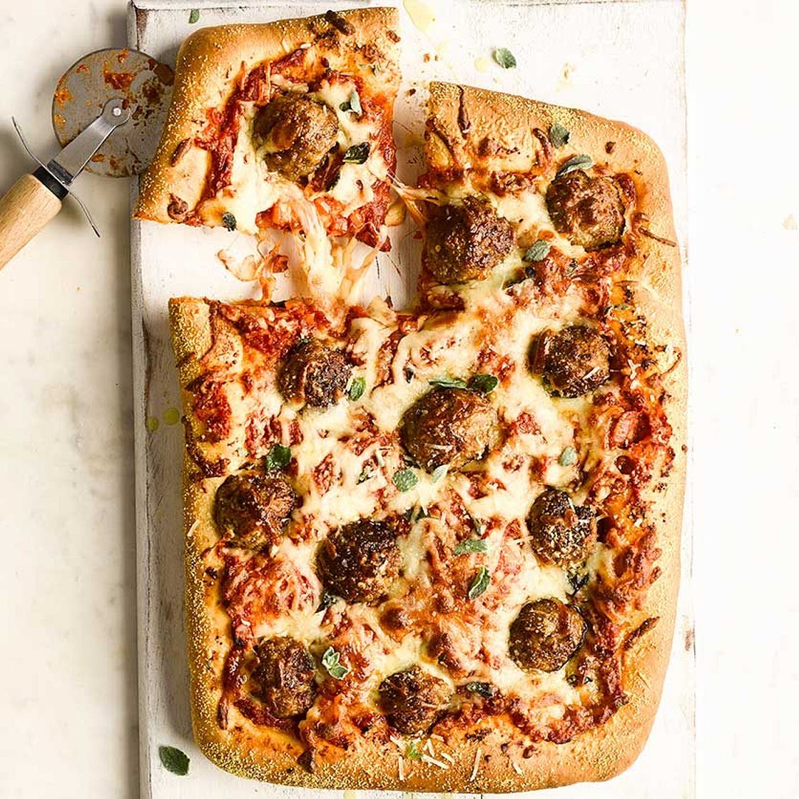 Deep-dish meatball marinara pizza