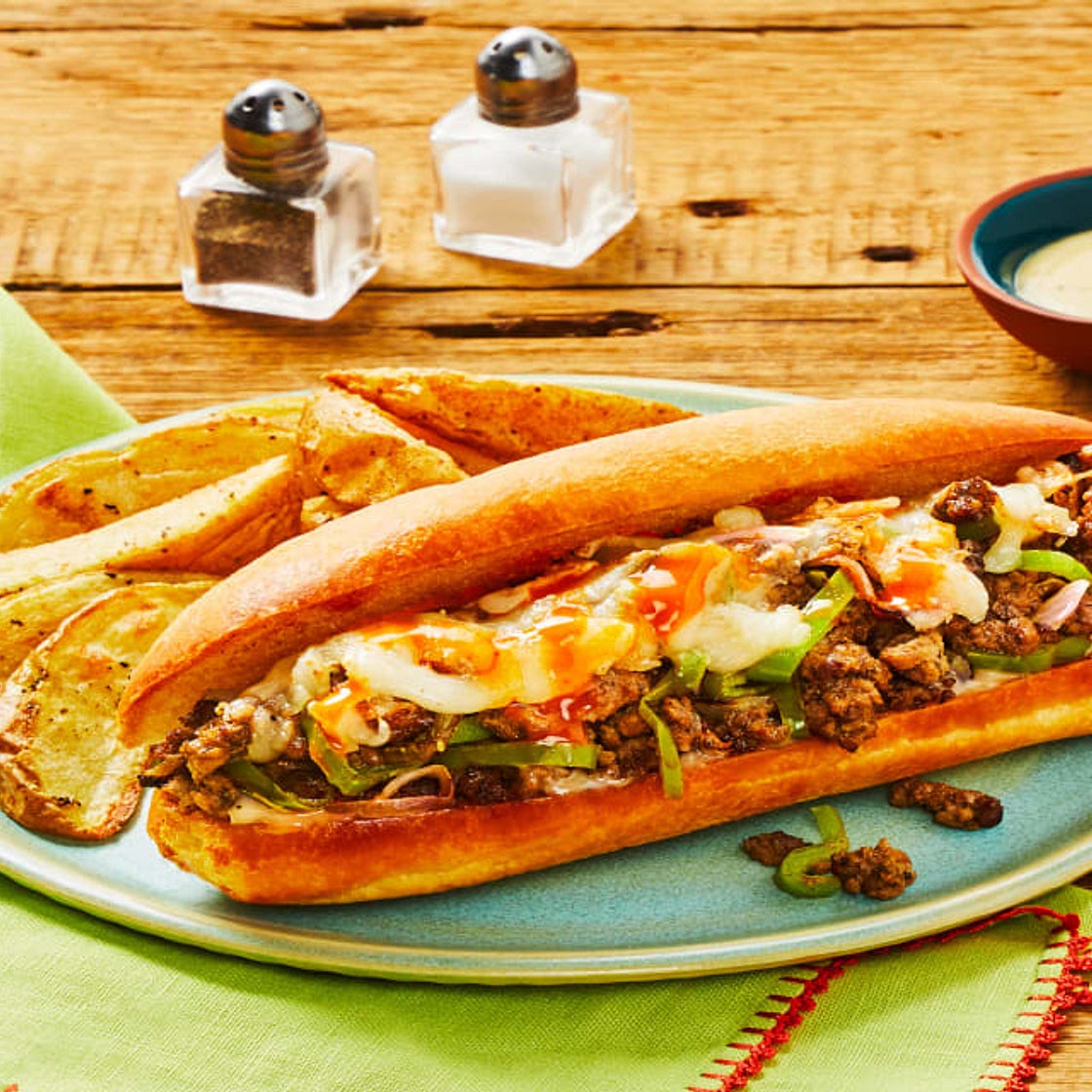 Italian Beef Melts with Onion, Pepper, Mozzarella & Roasted Potato Wedges