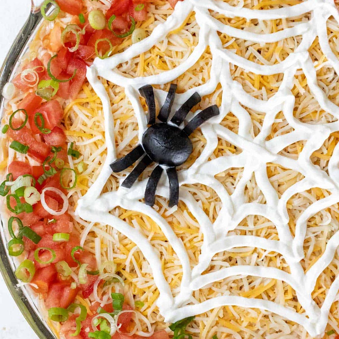 Spooky 7 Layer Halloween Spiderweb Taco Dip