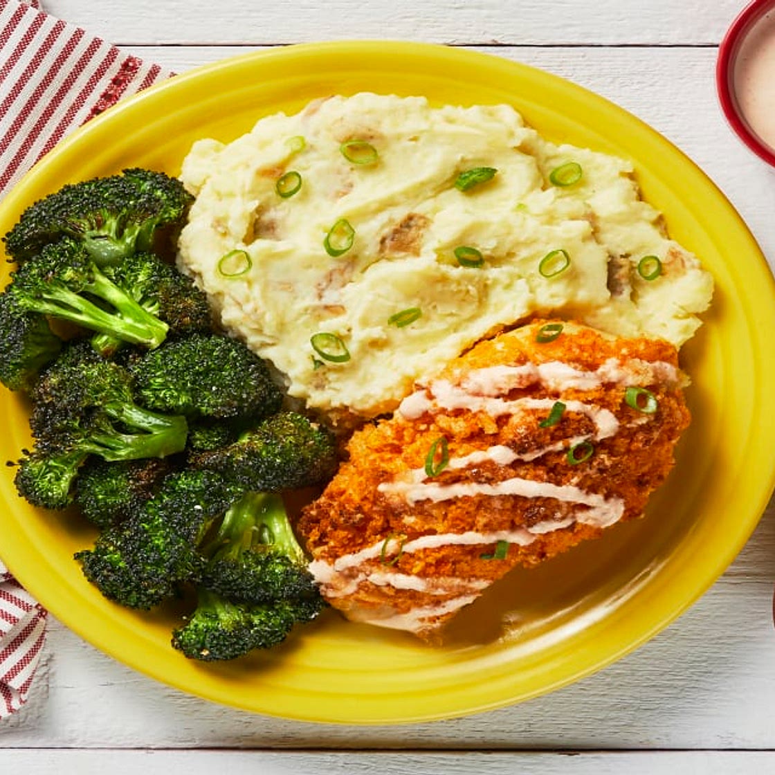 Crispy Kickin' Cayenne Chicken Cutlets with Monterey Jack, Mashed Potatoes, Buttery Broccoli & a Honey Drizzle