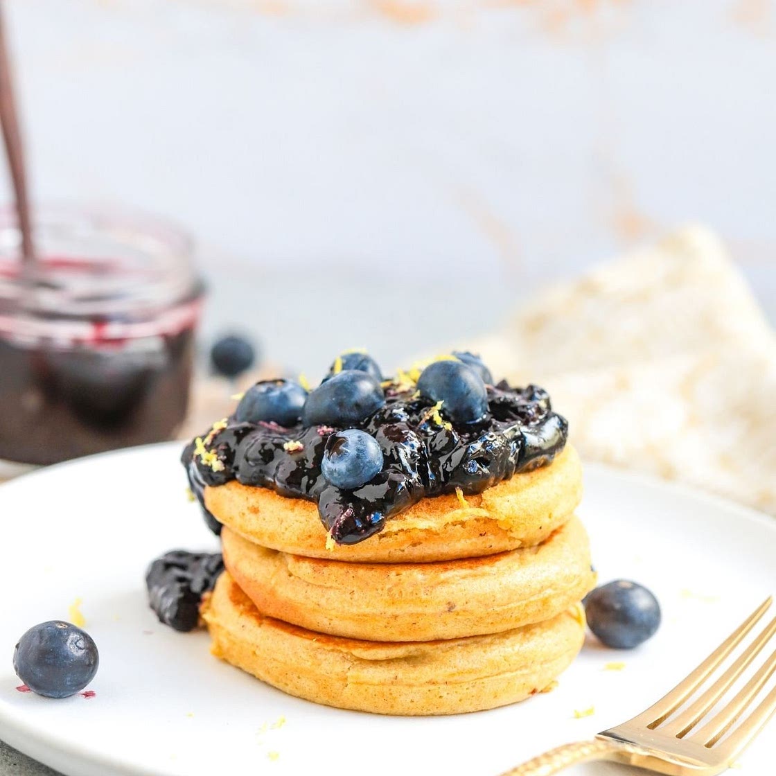 Fluffy Protein Pancakes with Blueberry Sauce