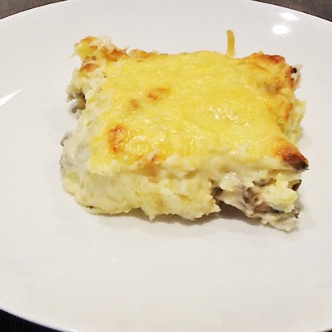 Überbackene Kartoffel mit Champignons