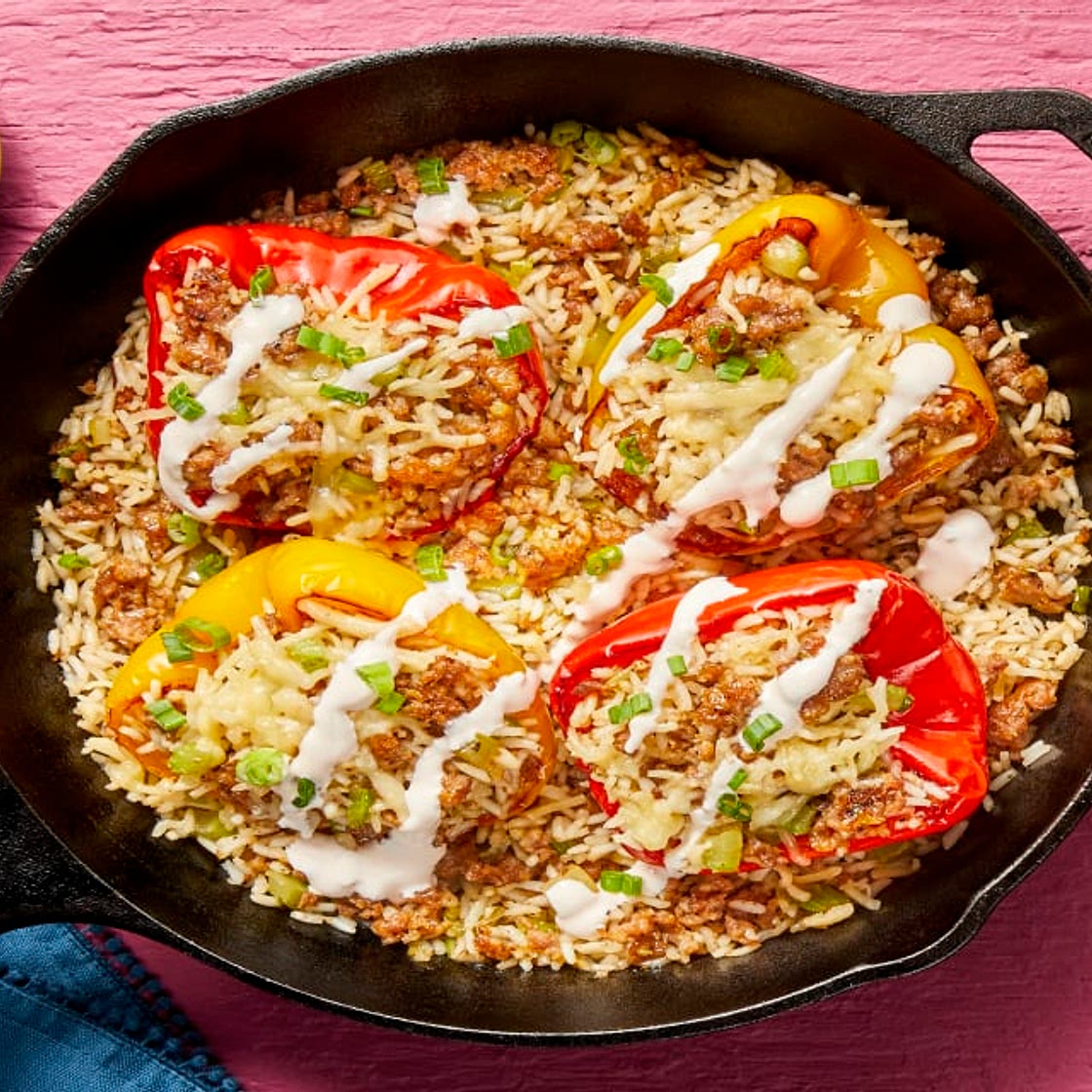 Cajun Pork Sausage Stuffed Peppers with Pepper Jack & Hot Sauce Crema