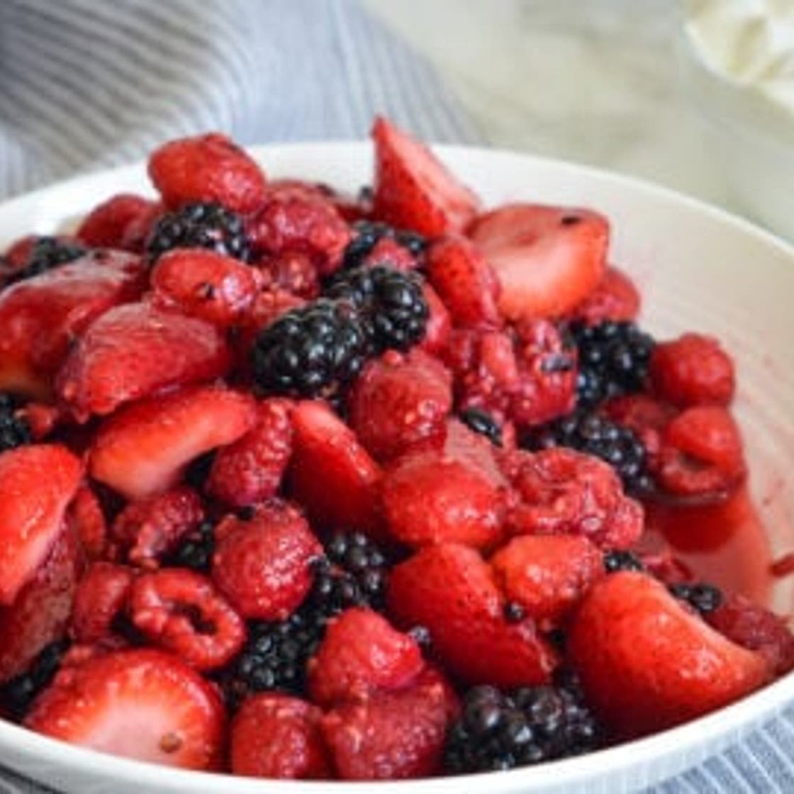 Gina Homolka's Macerated Berries with Greek Yogurt Whipped Cream