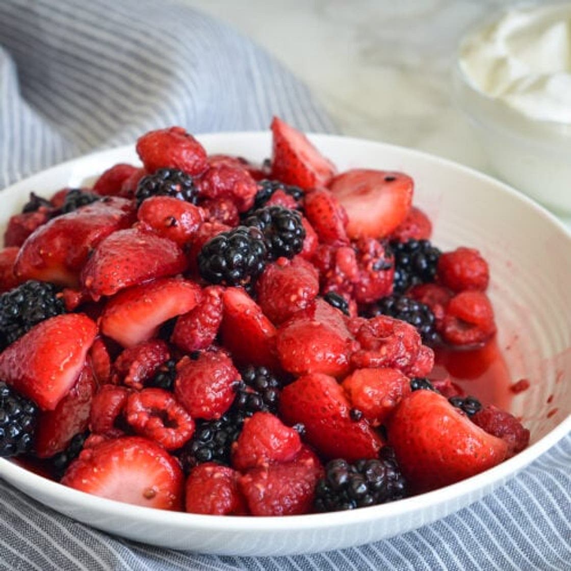 Gina Homolka's Macerated Berries with Greek Yogurt Whipped Cream