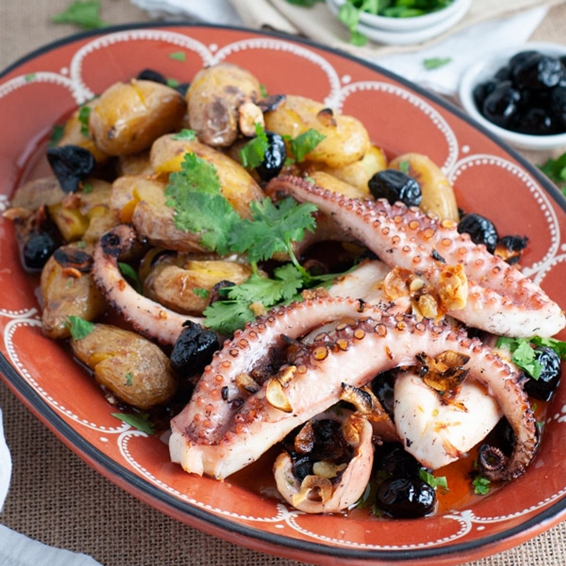 Portuguese style grilled octopus with smashed potatoes (polvo à lagareiro)