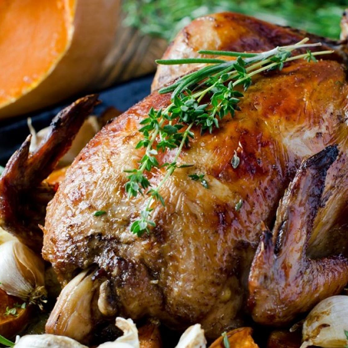 Poulet rôti au potiron, à l'ail et aux herbes