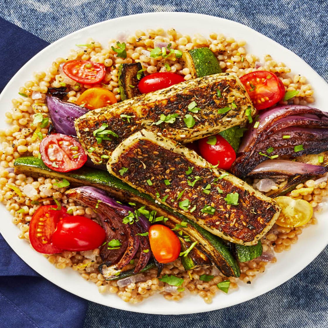 Za’atar-Crusted Grilling Cheese with Sumac Roasted Veggies over Couscous