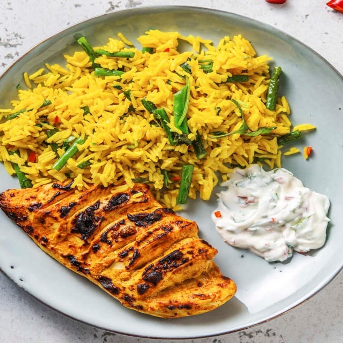 Tandoori Hasselback Chicken with Turmeric Rice, Green Beans and Red Chilli Yoghurt