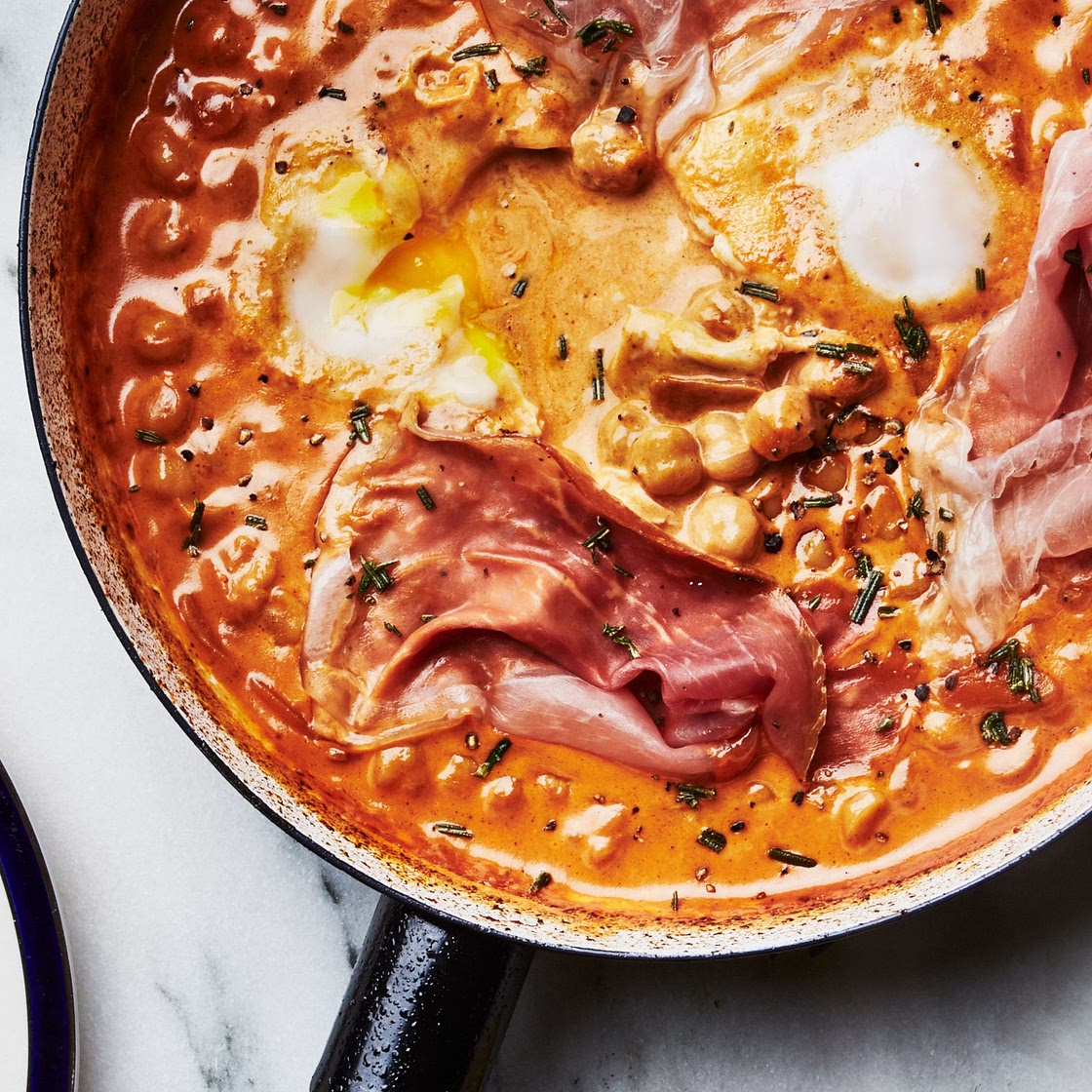 Spicy Creamy Chickpeas With Runny Eggs and Prosciutto