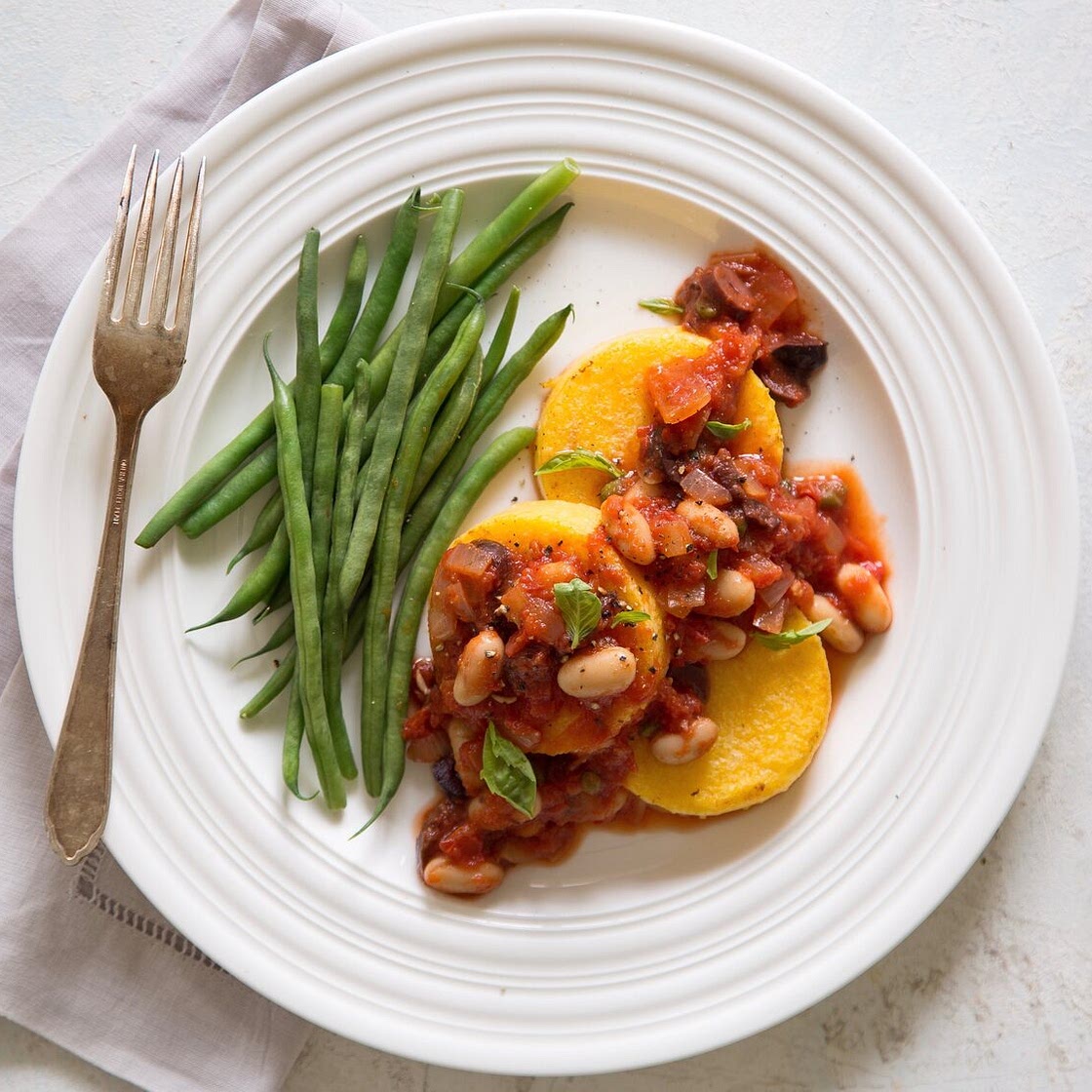 Polenta Rounds with White Bean Puttanesca