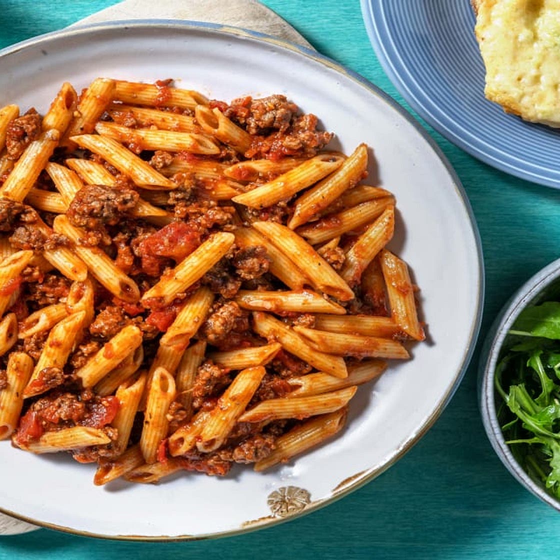 Beef Ragu Penne with Cheesy Garlic Bread