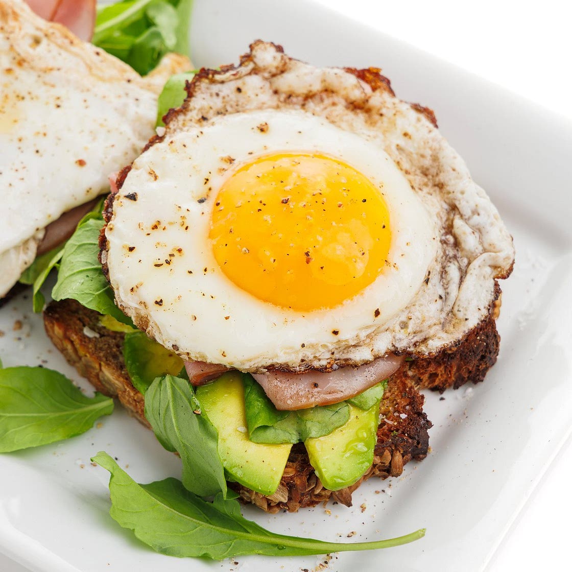 Avocado Toast with Egg, Ham, and Arugula