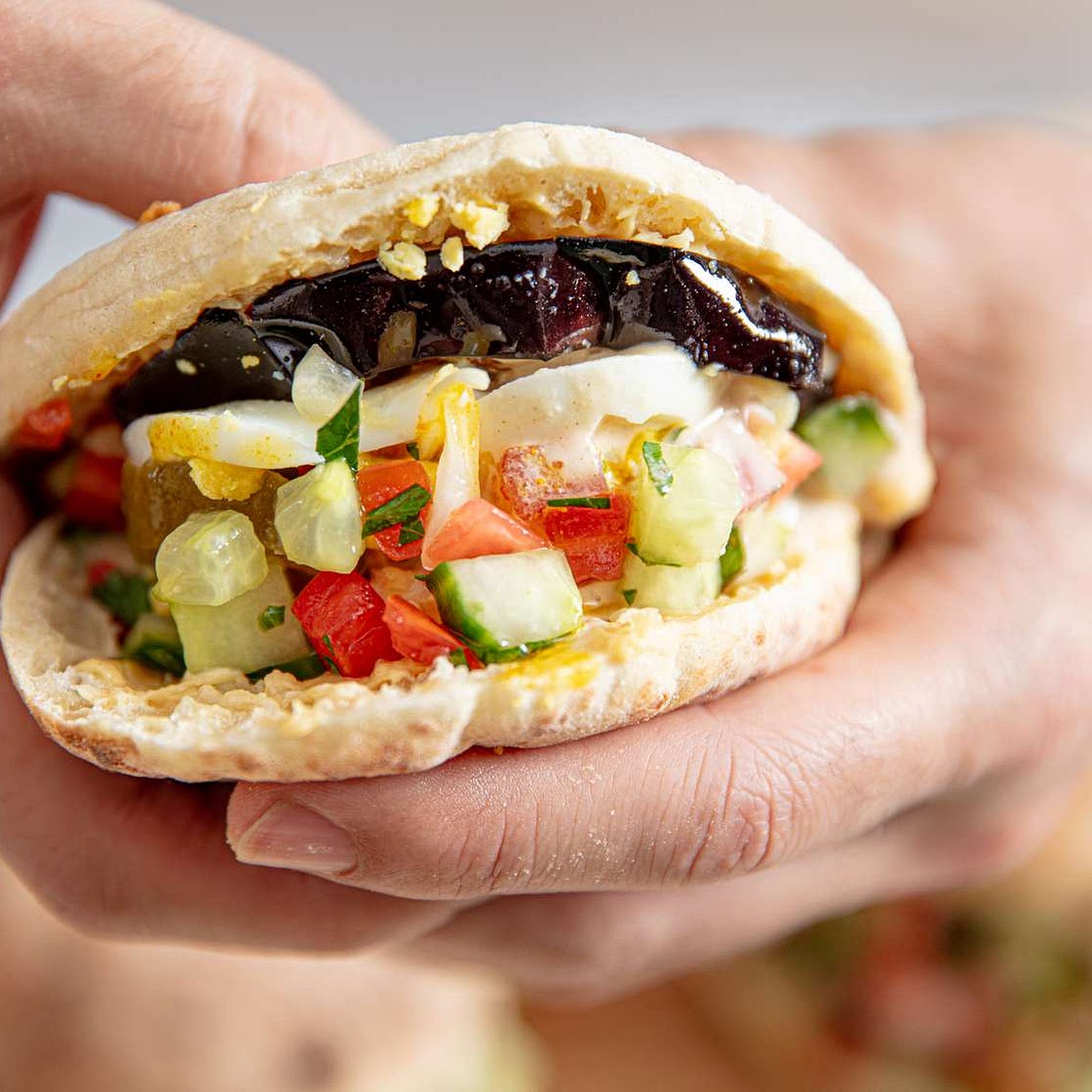 Sabich Sandwiches (Pitas With Eggplant, Eggs, Hummus, and Tahini)