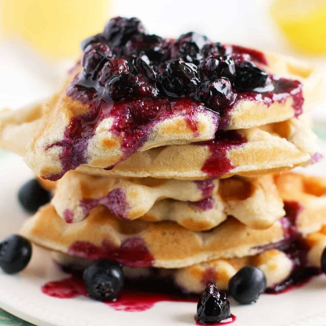 Light and Fluffy Vegan Waffles with Blueberry Sauce