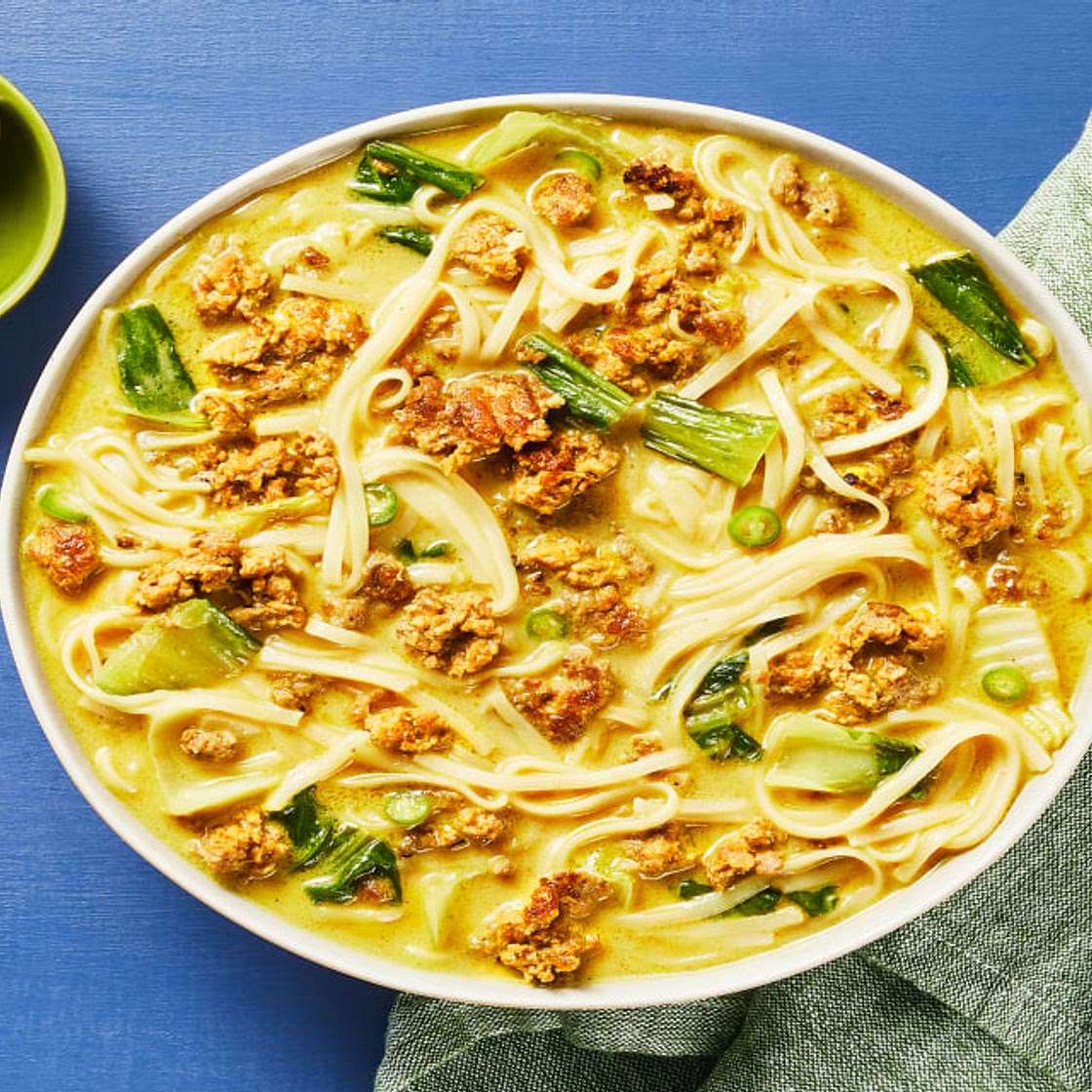 Spicy Coconut Curry Pork Noodle Soup with Bok Choy, Napa Cabbage & Lemon