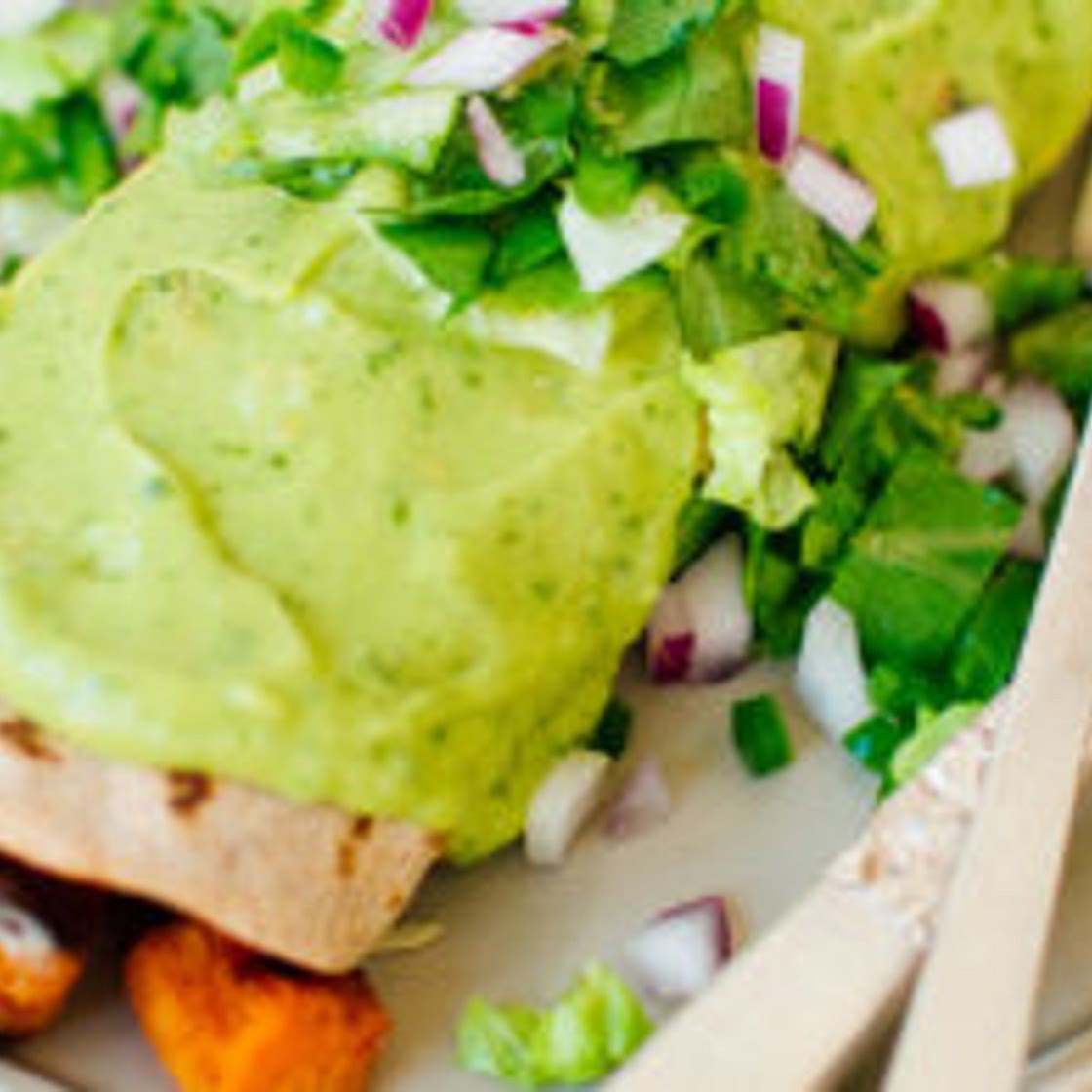 Sweet Potato Burrito Smothered in Avocado Salsa Verde