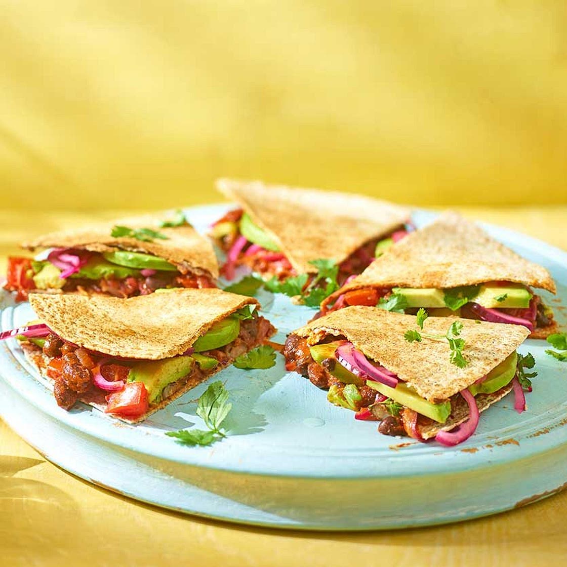 Spicy bean & avocado quesadillas
