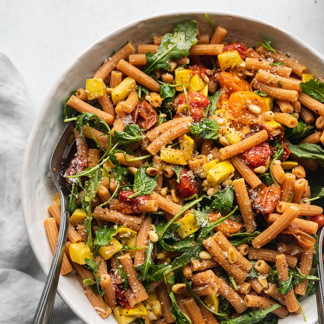 Garlic Roasted Tomato Red Lentil Pasta with Arugula and Toasted Pine Nuts