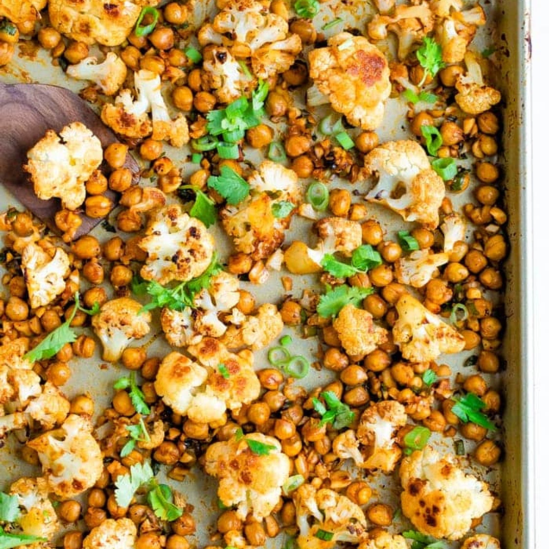 Sriracha Roasted Cauliflower and Chickpea Sheet Pan Meal