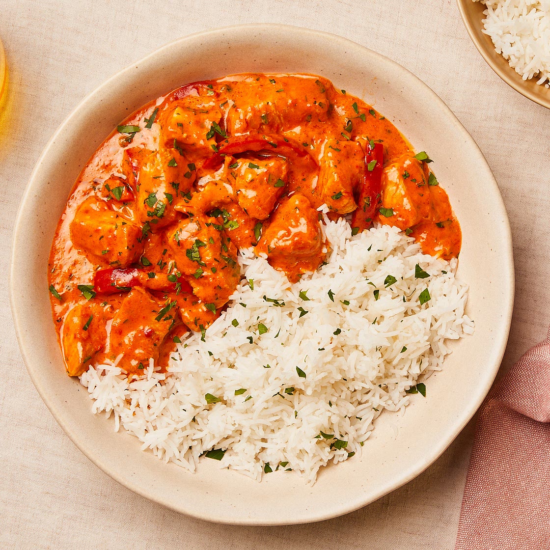 Creamy turkey and bell pepper over rice