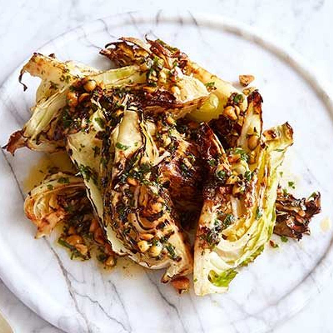 Charred hispi cabbage with hazelnut chilli butter
