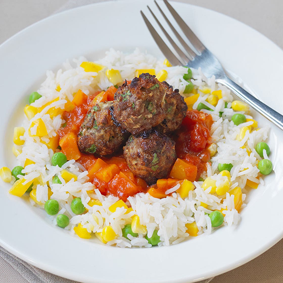 Sweet and sour meatballs with veggie rice