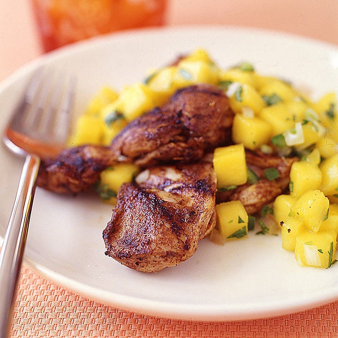 Jerk chicken thighs with mango salsa