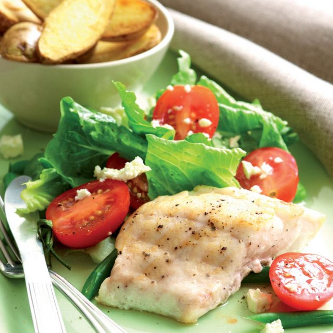 Fish and chips with tomato salad