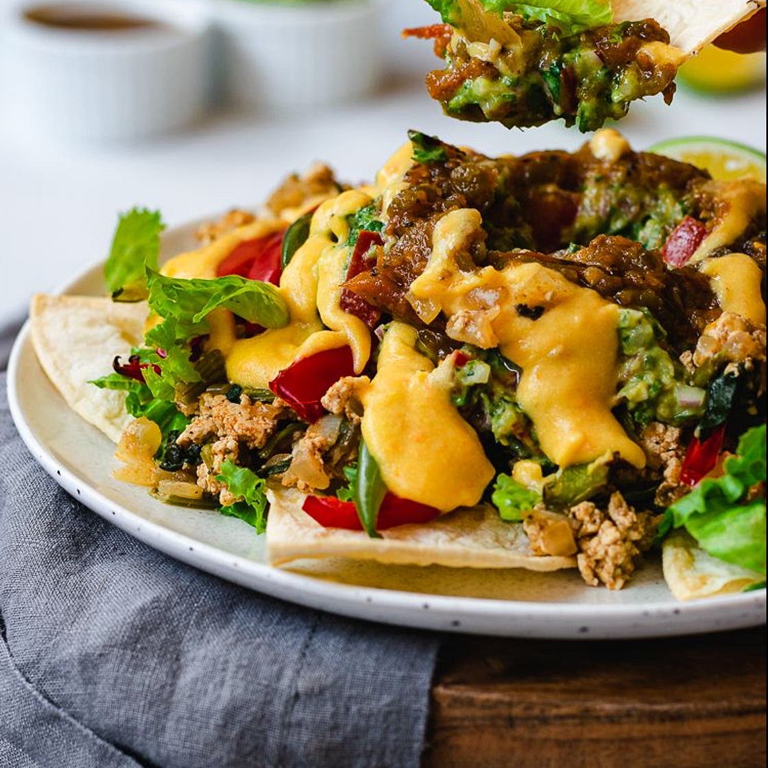 Loaded Spiced Tofu Nachos with Peppers and 'Cheese' Sauce