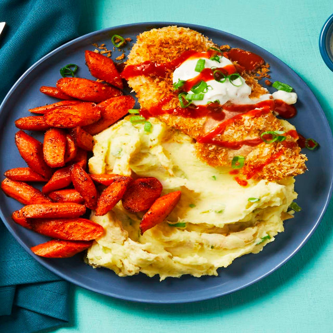 Crispy Buffalo-Spiced Chicken with Blue Cheese Sauce, Scallion Mashed Potatoes & Roasted Carrots