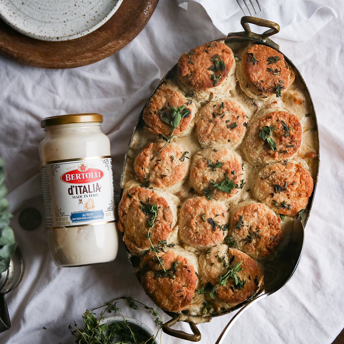 Creamy Chicken Alfredo Pot Pie topped with Buttermilk Biscuits