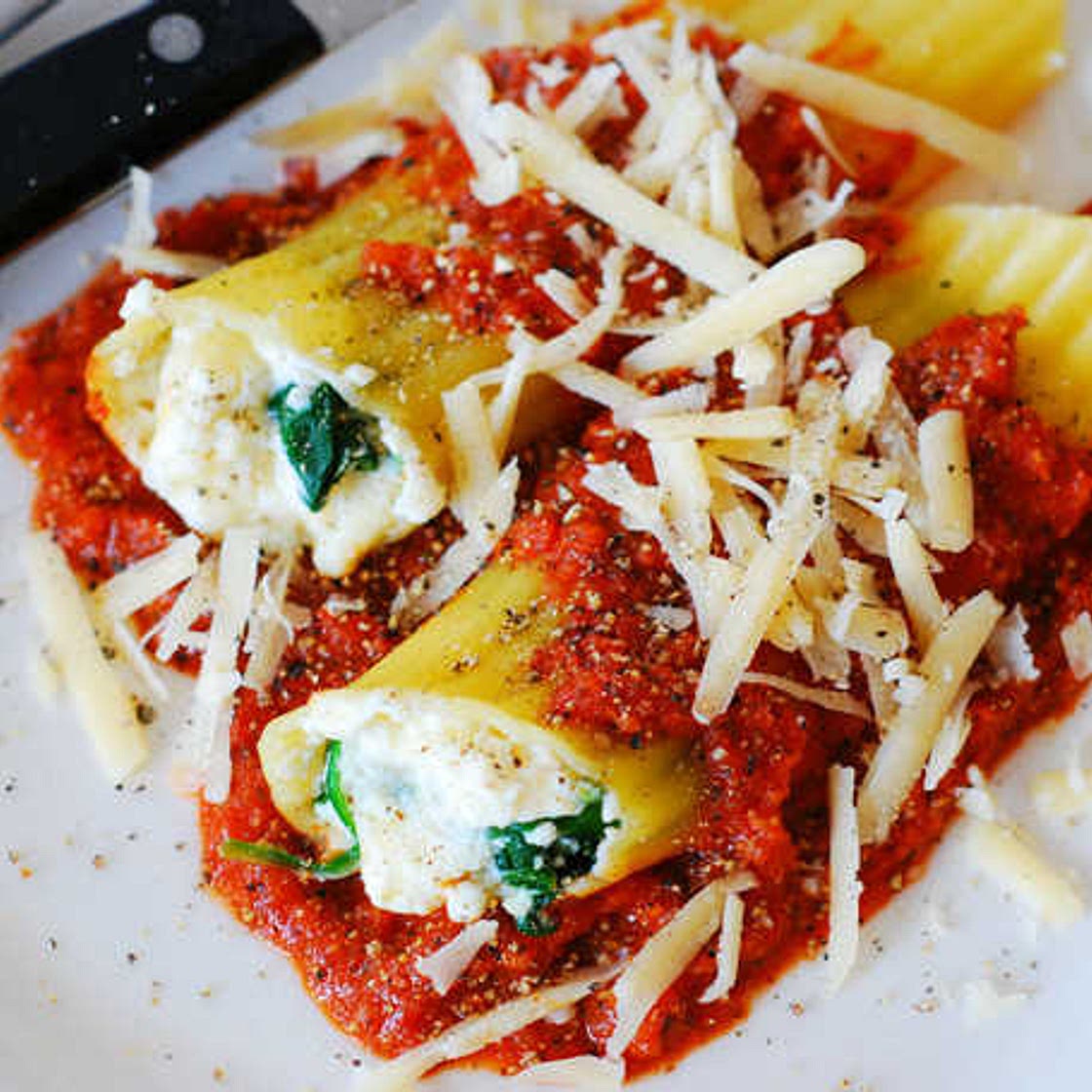 Stuffed Manicotti Pasta Shells with Ricotta Cheese and Spinach Filling