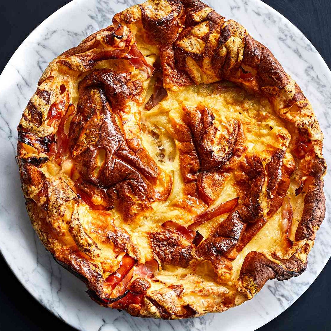 Polenta Dutch Baby with Ham and Swiss