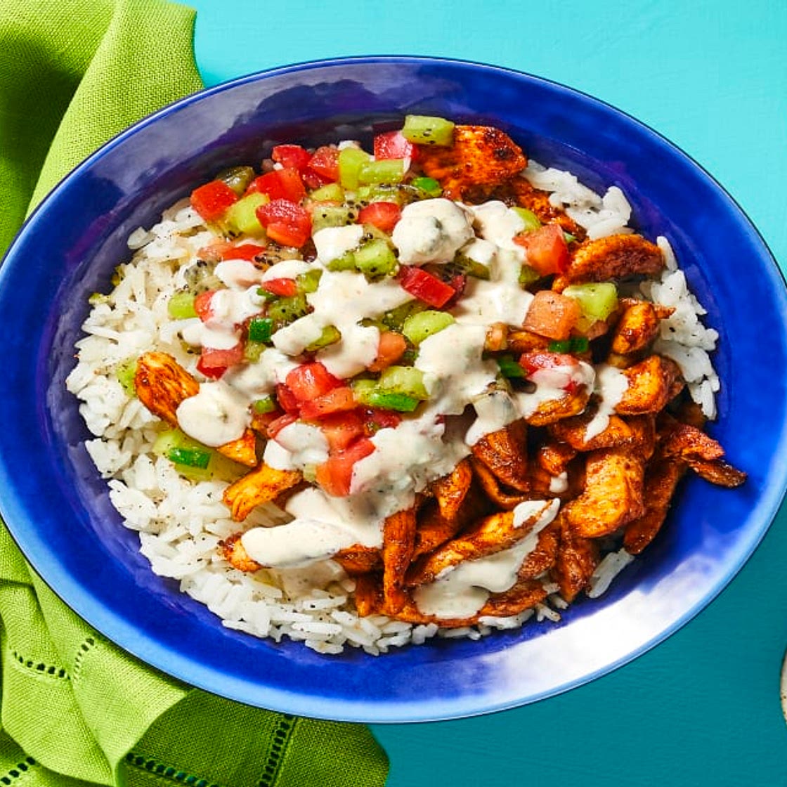 Surf’s Up Chicken & Rice Bowls with Kiwi Salsa & Ancho Lime Crema