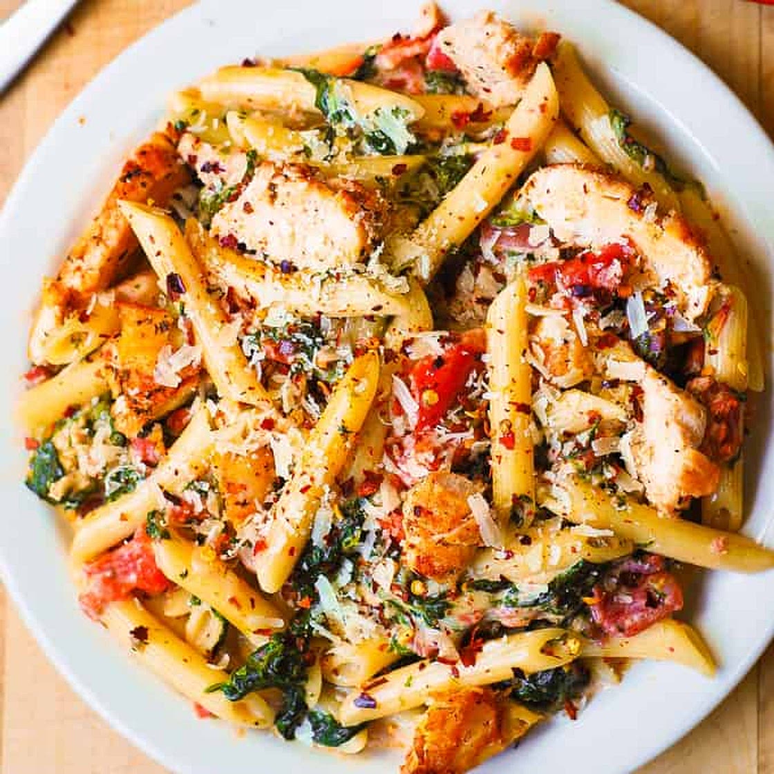 Chicken and Bacon Pasta with Spinach and Tomatoes in Garlic Cream Sauce