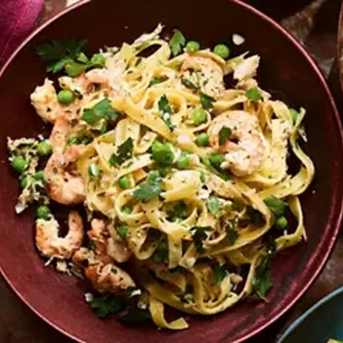 Fresh pasta with prawns, crab, peas & crème fraîche